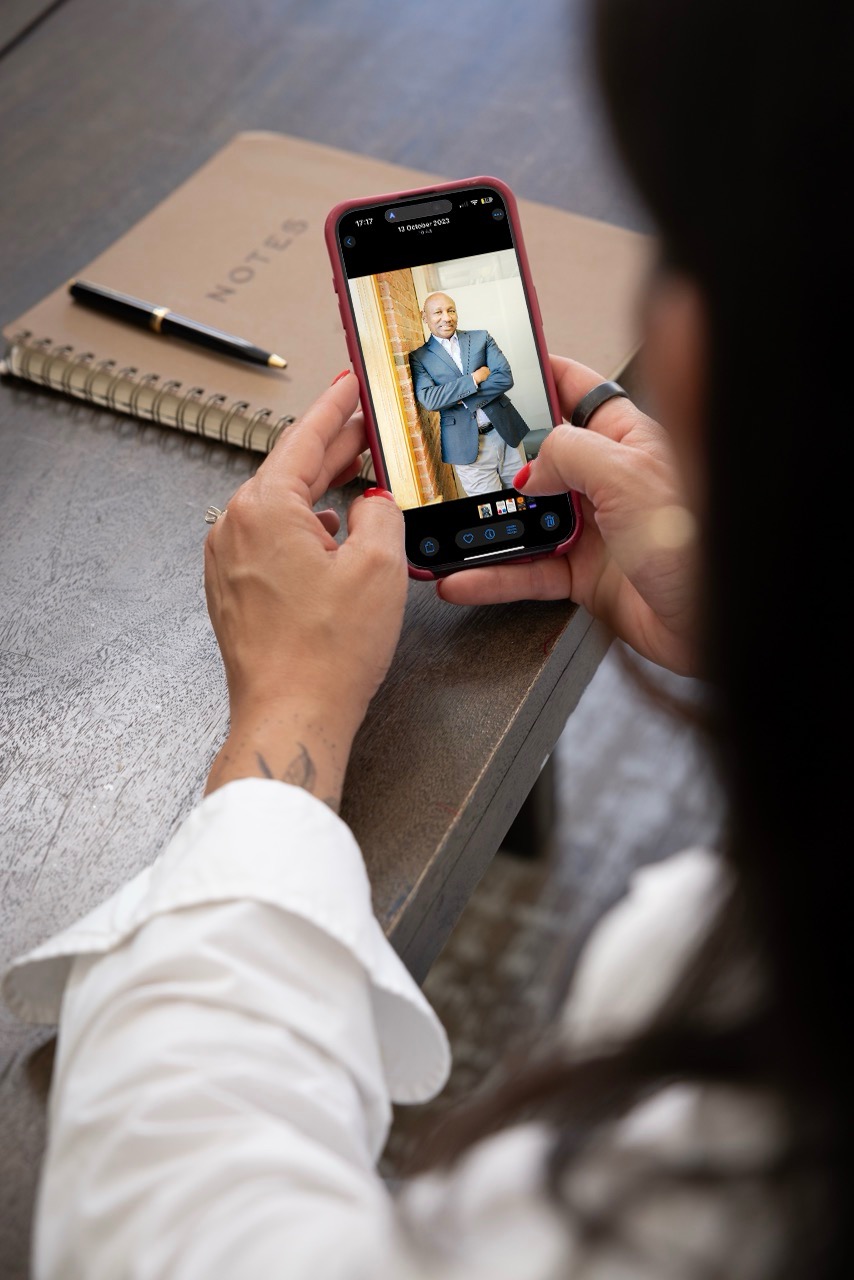 A person reviewing brand visuals on their phone